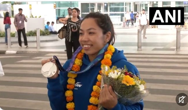 JindPress's tweet photo. Delhi: After winning a historic silver medal in the women's 49 kilogram weightlifting event at the Asian Games 2026 held in Japan, Indian weightlifter Saikhom Mirabai Chanu arrived at Indira Gandhi International Airport with her coach Vijay Sharma. https://t.co/EIP3ZGcFHo