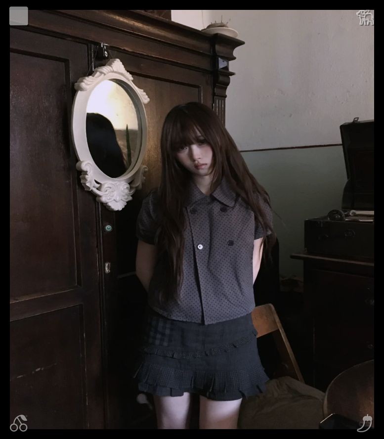 Vintage band tee with frayed denim shorts styling