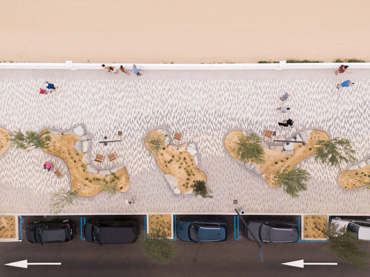 Archello's tweet photo. Héctor Navarro Architects’ Comillas Waterfront Promenade uses permeable paving, reclaimed limestone and native planting to reconnect the town with its coastline. 
https://t.co/Ayiy9bdWeS 

#MaterialReuse #PermeablePaving #LandscapeArchitecture https://t.co/YI4P03RT6n