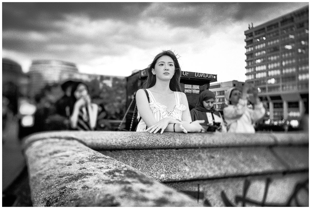 danielbatera666's tweet photo. Among the crowds, one face stood still. Using a tilt-shift lens let me draw the focus exactly where I wanted it, isolating a this moment on Westminster Bridge while the crowd carried on nearby. I prefer the B&amp;W version, but colour version in the https://t.co/MldZk0OaHk