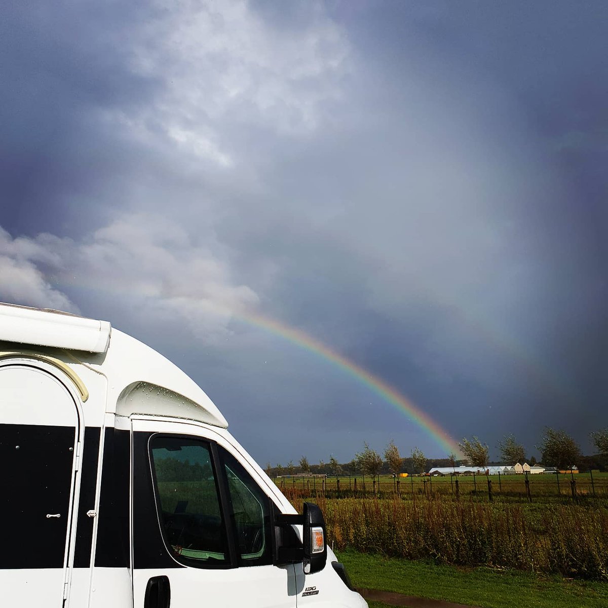 ChavesGiovani's tweet photo. Our house on wheels! This weekend with rainbow, after 7 weekends full of sun! ! #camper #camperlife #houseonwheels #rainbow #hollanda #holland_photolovers #hollandinbeeld #travel_ig #traveltheworld #nature #naturephotographer #zuidholland #clouds https://t.co/mbFzfg9RU1