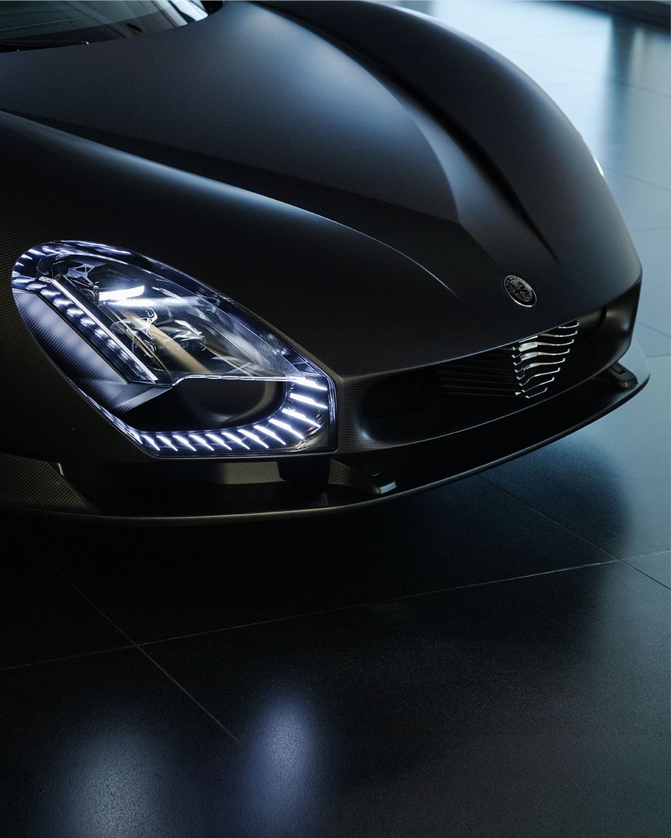 alfa_romeo's tweet photo. A true jewel of artisanal mastery. Unveiled at the Museo Alfa Romeo in Arese, the exclusive all-black, full-carbon #33Stradale “Perla Nera®”. Conceived and crafted around the vision of its owner, it will be on display at the museum until 18 October. https://t.co/fzJmY35ec9