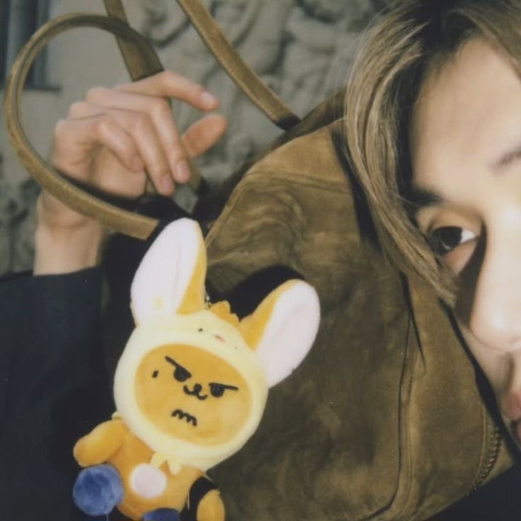 jjuniesito's tweet photo. the hwangchoon keyring on yeonjun’s miu miu bag was actually his own idea and he attached it himself aww soo cute thats literally his child https://t.co/v2XB6Y5IQu