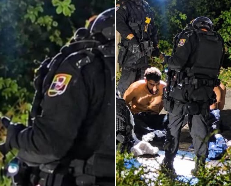 BGatesIsaPyscho's tweet photo. So what kind of Badges are these Responders wearing in Fairford as they apprehended the 5 Terrorist Suspects who have now been released on Bail?

This whole thing stinks &amp; the establishment of determined to bury it as soon as possible. https://t.co/cAOljf28sf