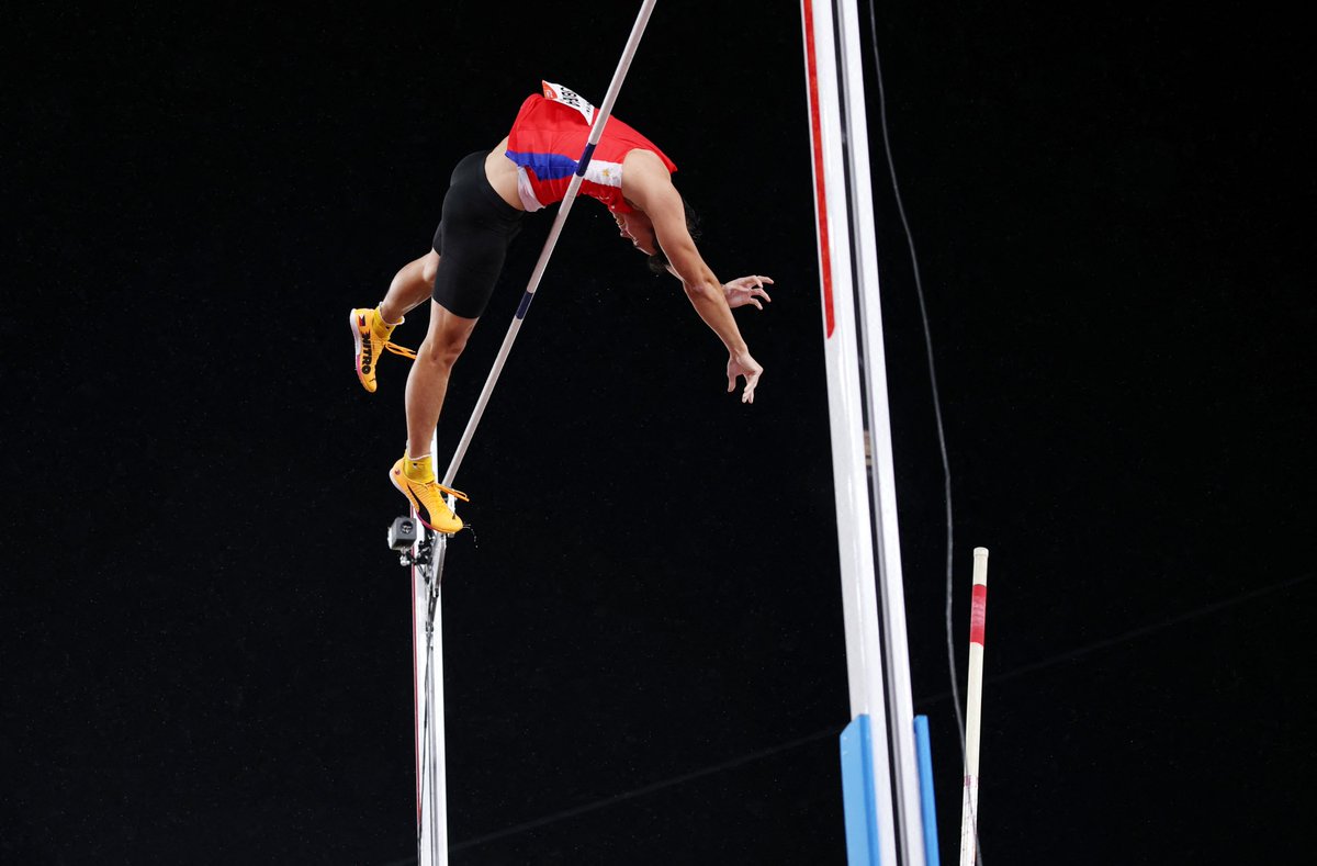 PhilippineStar's tweet photo. THIRD GOLD MEDAL FOR PH FROM OBIENA! 🥇🇵🇭

EJ Obiena delivered the Philippines' third gold medal at the 2026 Asian Games after dominating the men's pole vault final on Tuesday. 

The Pinoy pole vault ace also set a new Asian Games record after clearing 5.91 meters. (Wire photos/Reuters)