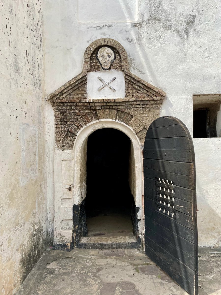 DavidHundeyin's tweet photo. I think many people who have never left their Nigerian hinterland before need to visit Elmina Castle someday and take note of where the church is located - directly above the slave dungeon. Praying to the lord on the top floor, while Africans physically rotted to death in filth undreneath. Whenever one of the Africans died, the oyibos would leave their chapel, go into the dungeon, remove them corpse and toss it into the sea.

Then go back to praying to white Jesus for a successful upcoming auction of African human cargo.

Maybe after doing the tour, it will provide some perspective and help them think about the implication of whether the descendants of the people who built Elmina castle have somehow grown to care about your miserable African life because you are a "Christian". The Africans they spent centuries raping in industrial numbers, using their skin as leather, hanging from trees, using their hair as sofa stuffing, and sometimes even eating outright, were "Christians" too.

Being a Christian never stopped an oyibo man from being about his money and power first and foremost. Unfortunately, it sometimes feels like the wrong people were loaded onto the slave ships. They left all the dummies and weaklings behind. Still too soft in the head to grasp something that oyibo's actions have spent the past 500 years trying to teach them.