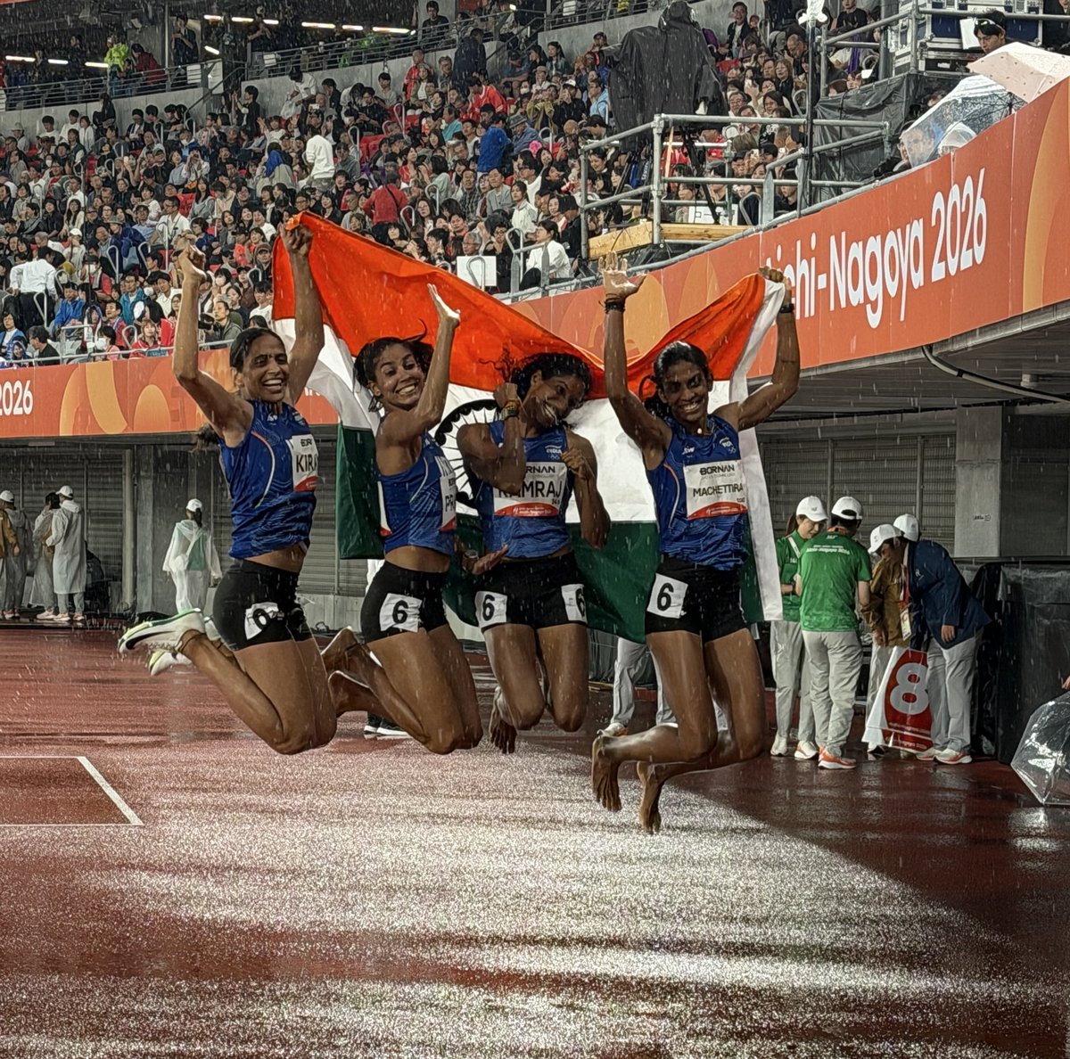 Non_rights's tweet photo. India’s golden girls singing in the rain… at #AsianGames #Nagoya https://t.co/TRTJcxTxXZ
