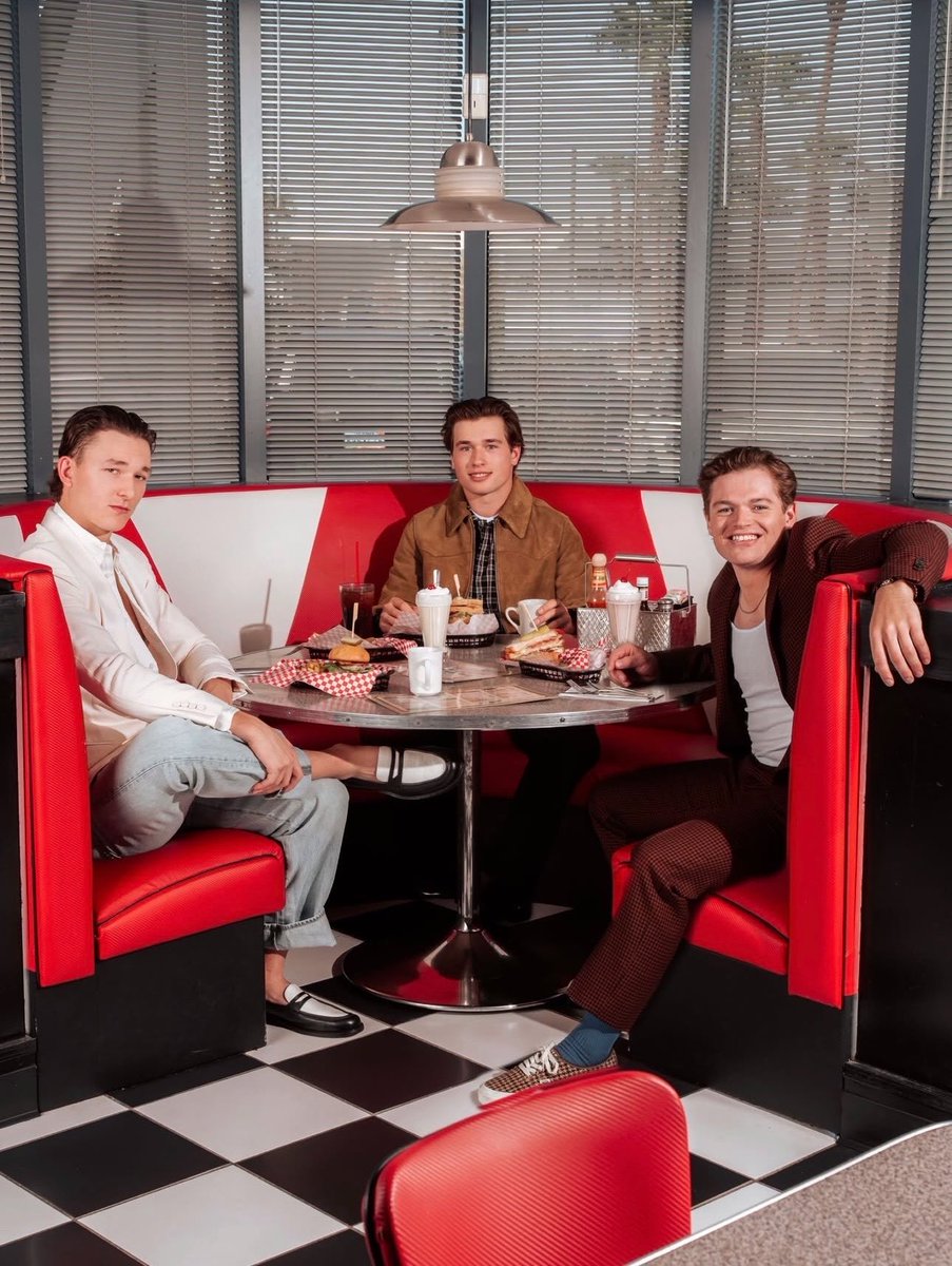 rawfearss's tweet photo. schaefer taking this as his serious modeling debut, cole just happy as hell to get free food, and mack counting down the seconds until he can leave because this is not what he signed up for when he said he wanted to play hockey 😭 https://t.co/v4bRsh26G6