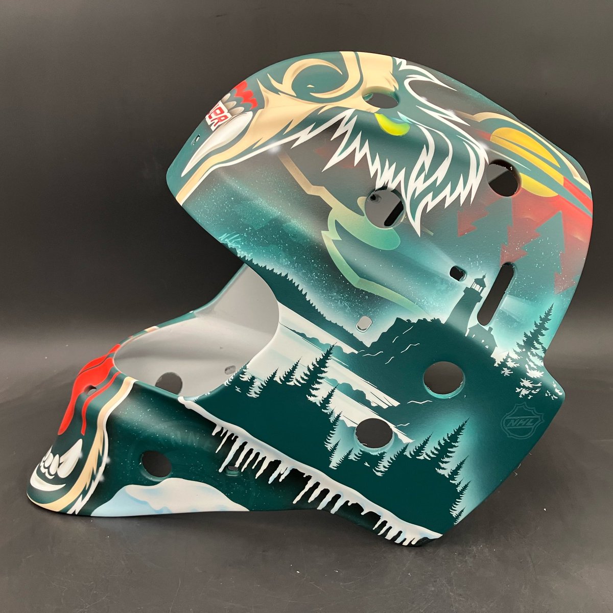 ShellShockCo's tweet photo. .@mnwild new mask for the clubs EBUG Peter Thome tying elements from Manny Fernandez old Wild mask and Peter’s home on the North Shore of Lake Superior #shellshock https://t.co/PVfIxCSQlE