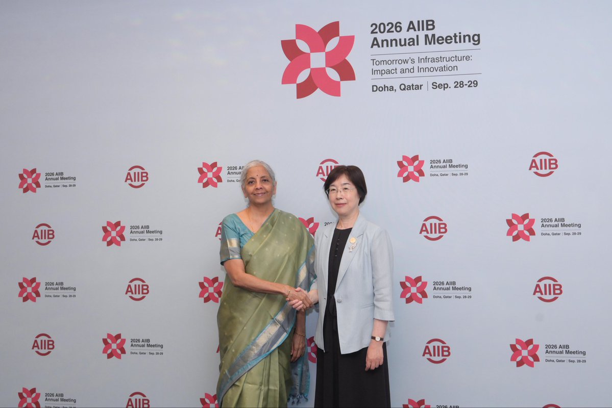 FinMinIndia's tweet photo. Union Minister for Finance & Corporate Affairs Smt. @nsitharaman met Ms. Zou Jiayi, President, Asian Infrastructure Investment Bank @AIIB_Official, on the sidelines of the AIIB 2026 Annual Meeting in Doha, Qatar, today.

President @AIIB_Official congratulated the Union Finance Minister on the successful BRICS Leaders' Summit in New Delhi. 

The Union Finance Minister congratulated AIIB on its strong performance in the first half of the year. She conveyed India's support for the Bank's 2027 budget plans and focus areas for scaling up operations. 

Both the leaders discussed the robust pipeline of AIIB's projects in India and expanding the global presence of AIIB, including in India.

Recalling her last visit to project sites in Delhi and Meerut, President AIIB said that the bank will continue financing projects for people, urban development and environmental protection.

The Union Finance Minister said AIIB could further expand beyond physical infrastructure financing to include newer infrastructure that focuses on AI, MSMEs, and skilling. FM noted that MSMEs are the backbone of India's economy, and assistance for AI adaptability and manpower training can help MSMEs.

FM Smt. @nsitharaman reiterated that the Bank's regional centrality should continue to remain a defining institutional characteristic and an important anchor of its mandate.