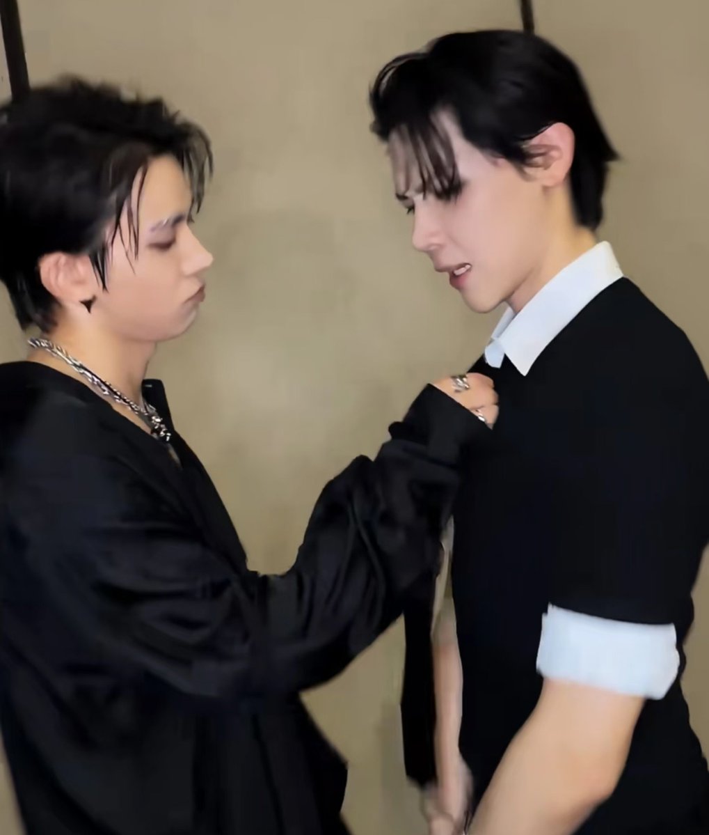 cuddlyheeseung's tweet photo. the way he's fixing nico's tie with a pout?! okayy i see https://t.co/zq5Ib1fzUl