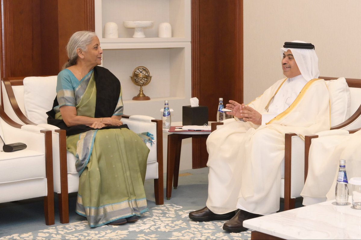 FinMinIndia's tweet photo. Union Minister for Finance & Corporate Affairs Smt. @nsitharaman met H.E. Mr. Ali bin Ahmed Al Kuwari, Qatar’s Minister of Finance @MoF_Qatar, on the sidelines of the AIIB 2026 Annual Meeting in Doha, Qatar, today.

The Union Finance Minister appreciated the excellent arrangements for the AIIB Annual Meeting. She recalled India’s recent engagements with Qatar’s leadership which elevated India-Qatar bilateral relations to a “strategic partnership”. 

H.E. Mr. Ali bin Ahmed Al Kuwari thanked the Indian community for being part of the success story of Qatar. He looked forward to bigger opportunities for strengthening trade, finance and investment relations between the two countries.

The leaders discussed expansion of Indian UPI payments across Qatar; implementation of $10 billion Qatari investment commitment in India; engagement with National Infrastructure and Investment Fund @NIIFIndia; and finalisation of the Bilateral Investment Treaty. 

They also discussed the Double Taxation Avoidance Agreement as a strengthened framework for trade, investment and tax certainty.