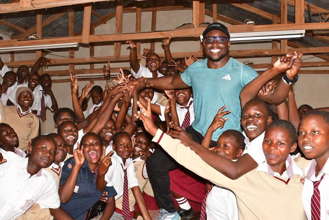 StapheyWairimu's tweet photo. A lot has happened these past few days around @Ferdiomanyala that has tickled further my passion for sports. He has visited 16 schools across Western Region opening Omanyala Sprint Clubs in High schools. Yesterday, I saw a huge banner in town, and dancers ferried him all the way to where his dreams began; Friends’ Schools Kamusinga.

Schools literally shut down, some thinking a politician locked out of the Lamu refiniery launch was touring the area. Some held a full sports day to watch sprinters compete. He has made young men believe, hey, maybe I could be the next Omwami! Not only boys even girls. An athlete is doing this! Toured three counties, giving young people opportunities he never had.

Last year, he was instrumental in the MOU between Team Kenya and Team Jamaica. Soon the coaches will visit Kenya and these are the projects they’d want to see.  

I get often asked, where do our athletes go? What happened to so and so? But the truth is, as an athlete what role did you play to cement yourself beyond the finish line? I’m proud of Omanyala is he has mastered sports branding & identity. 

Quite what @TergatP and @HKayangeOGW mastered years ago. Look at where they stand today.

Athletes, the truth is you will retire someday. The articles will stop. The hype will go down. Faster ones are not yet born. Sports is no longer ONLY measured by the number of medals you have otherwise, Omanyala who is not an Olympic Champion wouldn’t be bringing schools to a shut down than most of our Olympians.

We need to tell our athletes the truth, we’re in a different era. Performance matters equally as much as your story. 

Because your story is what remains when you leave the stage.

Look at Michael Jordan. Look at what he has built beyond basketball.

Yes we are Africans, but that is exactly why we should tell our stories, build our brands and inspire the world.

As I write this, my boss, @EliudKipchoge has just been announced as ambassador to @jojdakar2026 Eliud understood his evolution too; “Perhaps I am no longer running for medals, now I run for a purpose. 7 Marathons, 7 continents.” 

Omanyala is inspiring the next generation of sprinters. But he is also building something bigger than the sprint.

On Saturday, he has Omanyala 10’s, a grass-root mini- tennis tournament. A development for junior athletes, but beyond the court, I think I see where he’s going, you know, like how Lebron now does golf?😉. 

Sprinting is a short career. But look at how much impact one athlete can make beyond the track.

A good dancer knows when to leave the stage. A great one knows what to leave behind.

That is legacy. 

Legacy is an art, I have seen very few athletes master, but hey, this post is also for non-athletes. Maybe just my reflections.