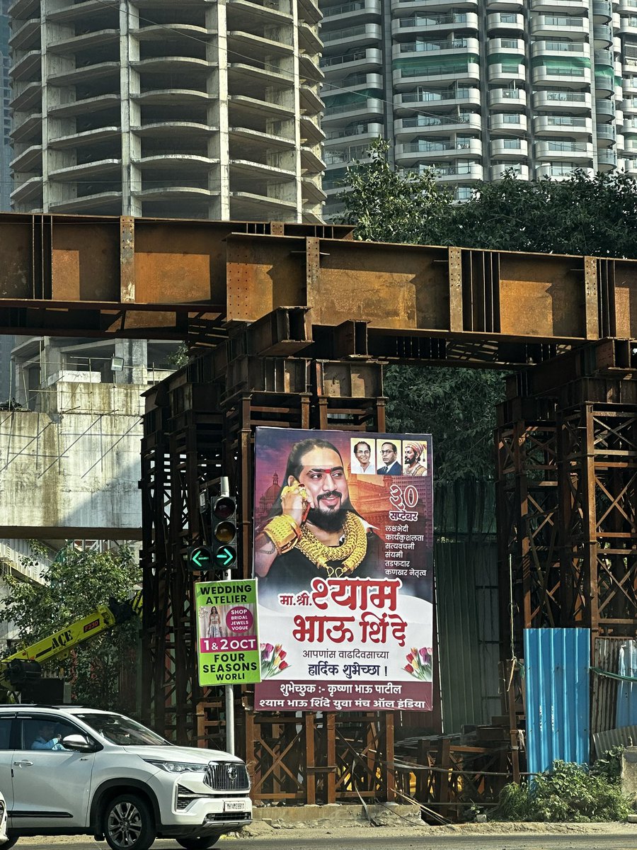 drifteternal_'s tweet photo. WHAT THE HELL IS GOING ON IN MUMBAI?

Look at this. A giant, grotesque political banner has been put up right on a main road in Worli, in broad daylight, completely taking over public space.

Seriously, how does this even happen?

Do people just walk in, put up whatever enormous banner they want, and leave?

And then BMC has to spend OUR MONEY taking this crap down?

What happens to the people who put it up? Who pays for the removal? Who gets fined? Who is held accountable?

@mybmc @MumbaiPolice
