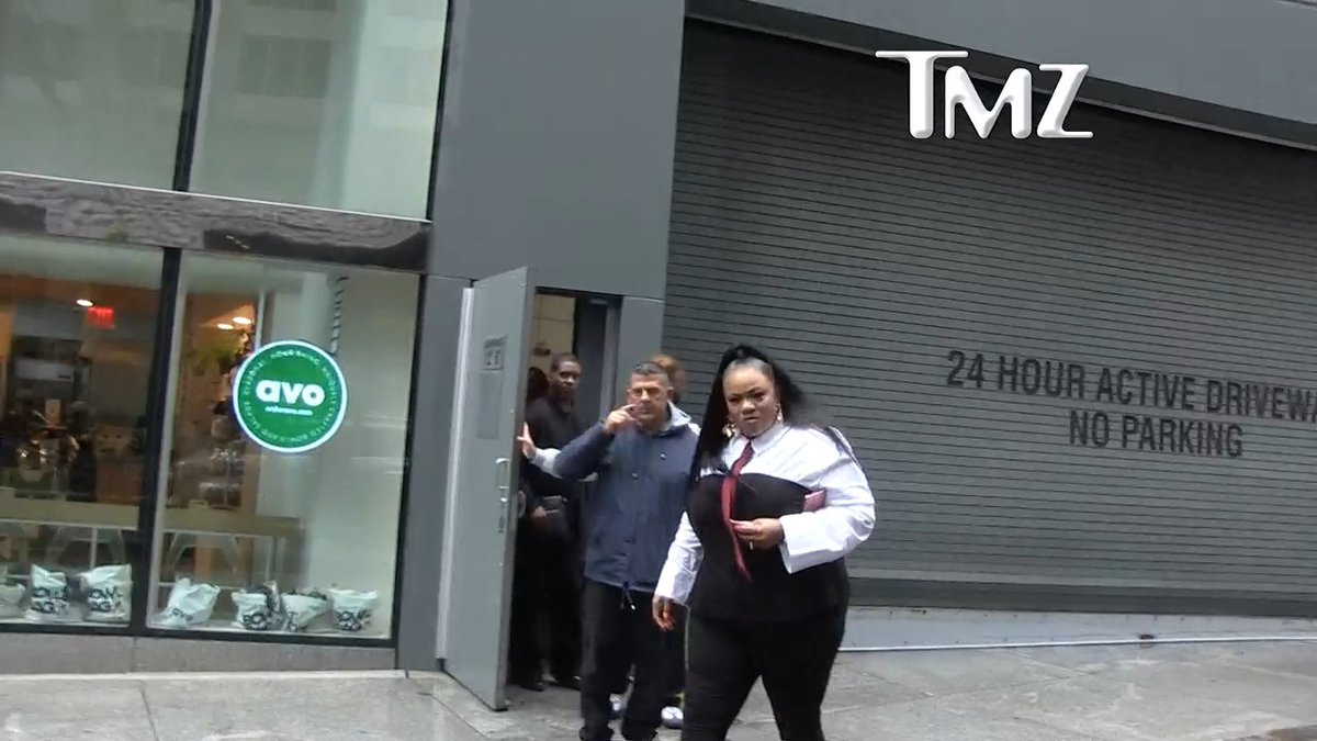 A TMZ news screenshot shows people exiting a building next to a storefront with an 'avo' logo and a '24 HOUR ACTIVE DRIVEWAY NO PARKING' sign.