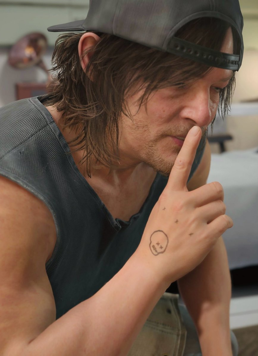 cheeky_sammy's tweet photo. I genuinely can’t see Sam without my tar handprint tattoo anymore 

I keep looking at his hand in the game and I’m like... SOMETHING IS MISSING

#DeathStranding2 https://t.co/8pn1sirCqU