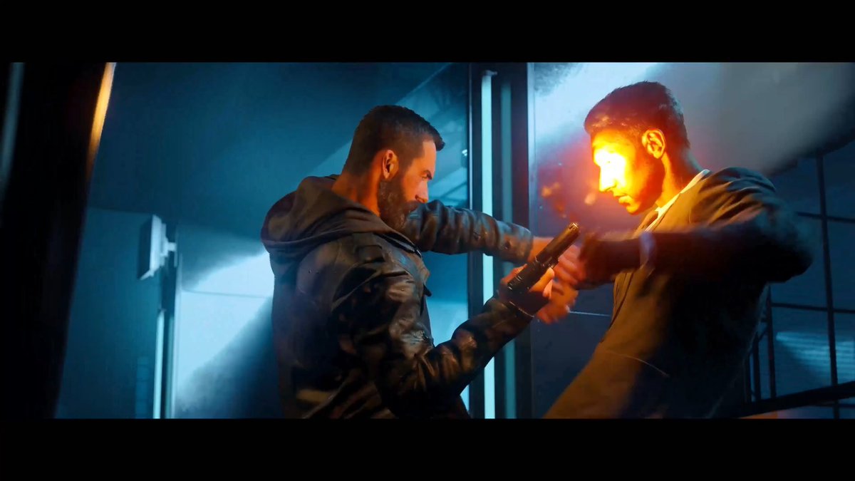 A bearded man in a dark hooded jacket fires a pistol point-blank at another man, whose face is brightly illuminated by the muzzle flash in a dimly lit room. The cinematic, action-packed shot captures the intense moment from what appears to be a Call of Duty campaign, reflecting the post's admiration for the game's dramatic visuals despite reluctance to purchase the full title.