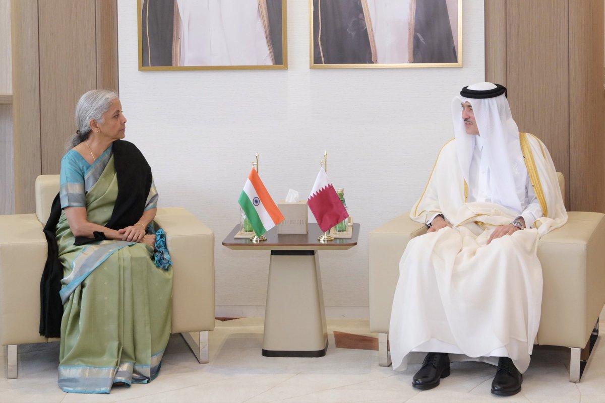 FinMinIndia's tweet photo. Union Minister for Finance & Corporate Affairs Smt. @nsitharaman met Dr. Ahmad bin Mohammed Al-Sayed, Qatar Minister of State for Foreign Trade @MOCIQatar, on the sidelines of the AIIB 2026 Annual Meeting in Doha, Qatar, today.

Dr. Ahmad bin Mohammed Al-Sayed warmly recalled his visit to India in 2025 and observed that there was considerable scope for investment in India in several infrastructure sectors including ports, airports, highways and power, and opportunities for Indian companies to invest in Qatar in areas including food security, pharmaceuticals, petrochemicals, education, health and start-ups.

FM Smt. @nsitharaman conveyed that India attaches high importance to enhancing trade and investment with Qatar, noting the elevation of bilateral ties to a “strategic partnership” during the State Visit of H.H. the Amir of Qatar in February 2025. She highlighted trade and investment as important pillars for adding strategic dimensions to the relationship.

The Union Finance Minister emphasised the importance of restoring normal trade between India and Qatar and other Gulf countries, including unimpeded maritime navigation and commerce through the Strait of Hormuz.

They also discussed the implementation of the $10 billion Qatari investment commitment and establishment of a QIA office in India. They both expressed keen interest in completing the Bilateral Investment Treaty with Qatar, for which they decided on accelerated engagement, as well as the Free Trade Agreement (FTA) negotiations.