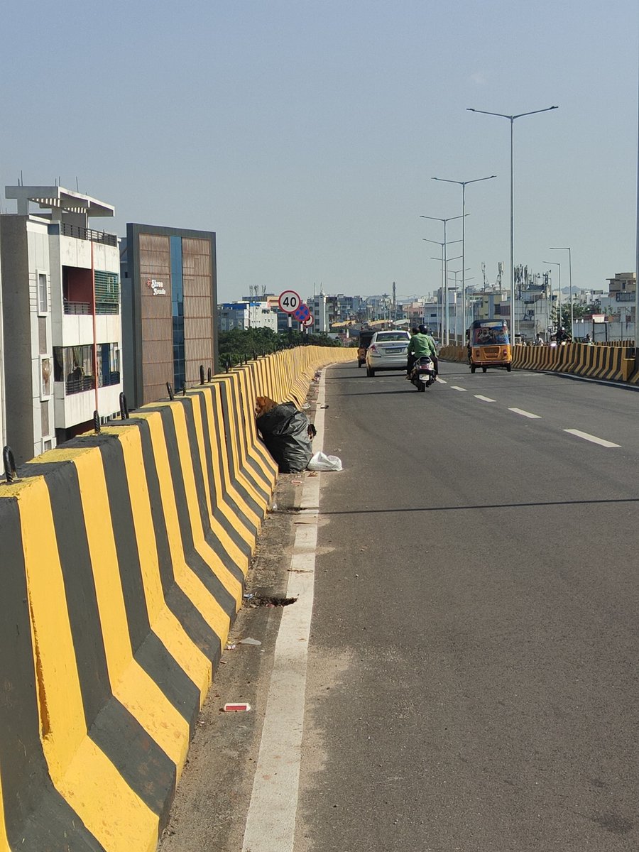 connectabsar's tweet photo. @DC_SantoshNagar @GHMCOnline Please look into this newly opened steel flyover condition at Santoshnagar-Saidabad-Malakpet. Irresponsible citizens are throwing garbage and keeping garbage bags at this flyover. 
Place: Near Sree Arcade Building
Time: 3-3:30 PM https://t.co/c7tUukPlxh