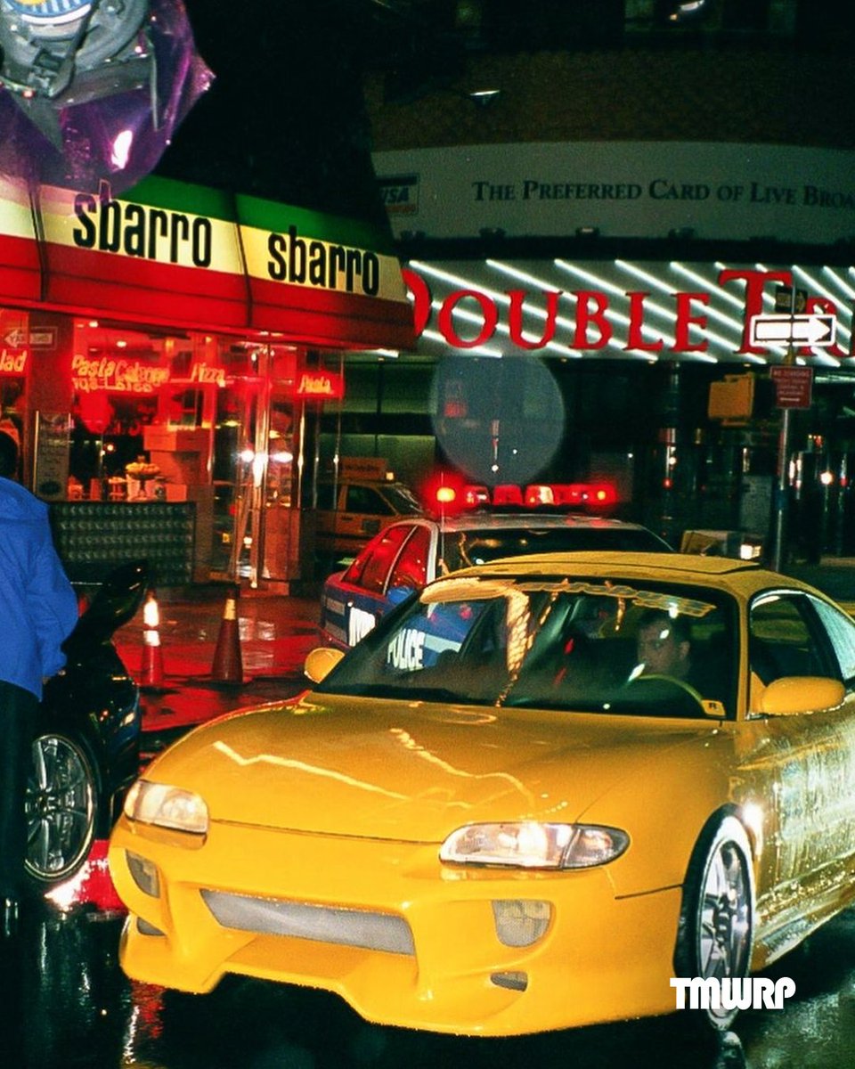 Retrotimewarp00's tweet photo. Rockstar Shut Down Times Square To Do The Photoshoot For Midnight Club.

The name of this game is inspired by the real midnight club underground racing group in Tokyo Japan that used race on the Wangan, so I’m happy that actually included JDM cars for the cover. https://t.co/B4DSsHNKVg
