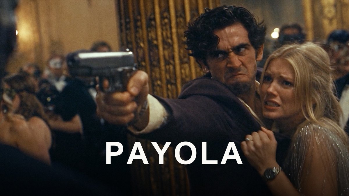 A dramatic scene from a film shows him holding a gun while protecting a blonde woman, with the word "PAYOLA" displayed prominently at the bottom.