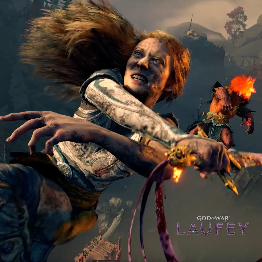 A fierce, red-haired warrior with bared teeth lunges forward dramatically in mid-air combat, with "GOD OF WAR LAUFEY" displayed in the bottom right corner. The image promotes the pre-order announcement for God of War's Laufey character, showcasing her in dynamic battle with a flaming enemy in the background.