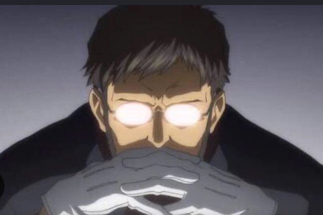 An anime character with glowing glasses and gloved hands clasped together in front of his face.