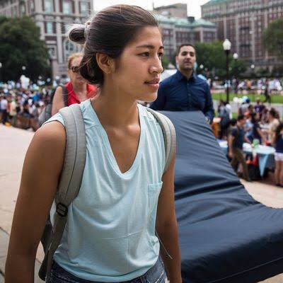 landpalestine's tweet photo. This is Emma Sulkowicz

She was a Columbia student who spent months carrying the mattress she was raped on across campus in 2012 

Can you imagine her rapist Paul Nungesser was never expelled or criminally charged 

So she decided she will carry the weight herself. Every day, across campus, in front of everyone

the same thing happened at Cornell university  Somehow the school failed to confront the 7 rapists, and the survivor was left carrying the weight