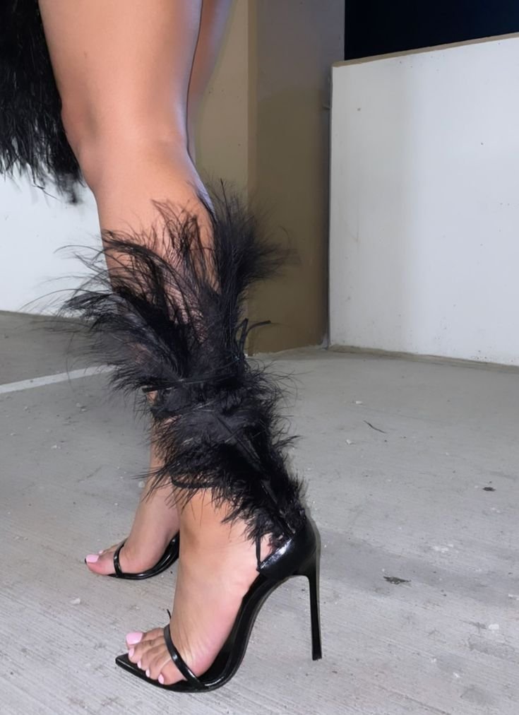 s0nofzion's tweet photo. saint laurent feather-trimmed patent stilettos https://t.co/kAwJALLHBI