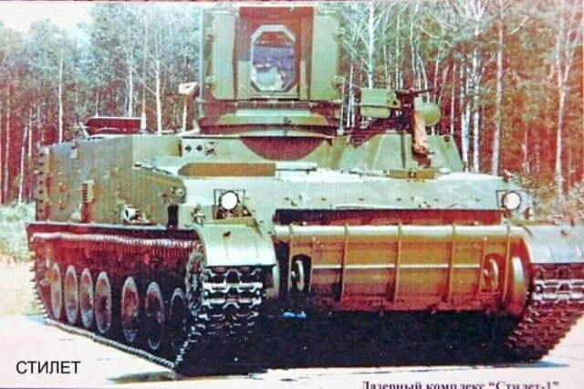 KrypTanko's tweet photo. Today's "Odd Tank" is the Soviet '1k11 Stilet'

Built in the late 1970's, the 'Stiletto' was an experimental self propelled laser which was based on a variation of the SU-100P platform.
The laser weapon was used to attack sensitive electronic equipment like optics and sensors and had the capability of instantly blinding humans.
Only two 1k11's would be built, but wouldn't be the only vehicle of this type that the Soviets would produce.