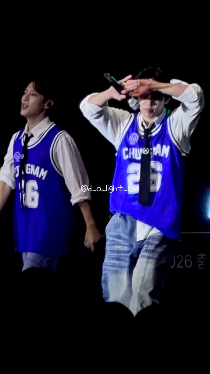 Two performers on stage wearing purple 'CHUNG NAM' jerseys (numbers 16 and 26), with the watermark '@d_o_light_' visible.