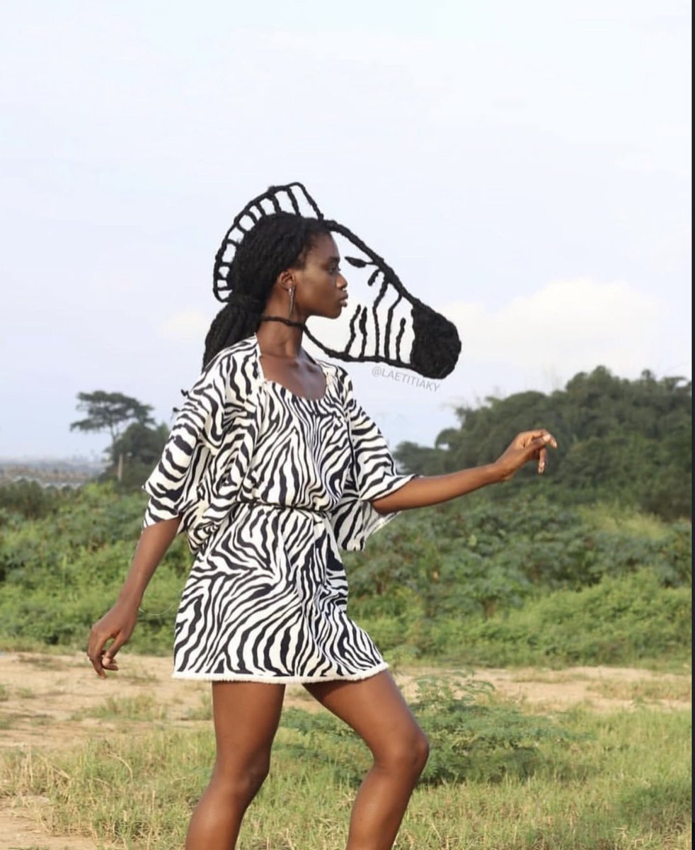 pmamtraveller's tweet photo. Laetitia Ky, is an Ivorian artist and activist known for shaping her hair into incredible sculptures. https://t.co/fE6sLQuUU5