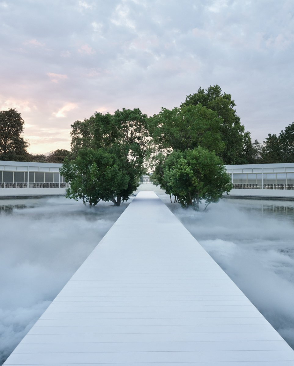 Dior's tweet photo. The Dior Summer 2027 Women’s show was held at Le Bassin Octogonal in the Jardin des Tuileries, Paris, where a cluster of camphor trees was especially installed. They will be replanted in the Tuileries and continue to flourish in the years to come.

https://t.co/ijL6mIZwTH

#DiorSummer27