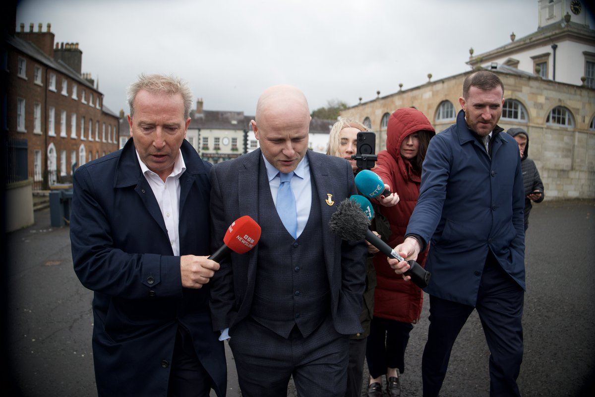 Kscott_94's tweet photo. Update: Jamie Bryson has arrived back at the talks here in Hillsborough - for a short time he retired to a bar facing the Castle - around 20 mins ago an unmarked armoured police car went around the back of the premises, it’s unknown who was inside, this left a short time later and Bryson then emerged, he commented he is only here to support the rule of law @BelTel