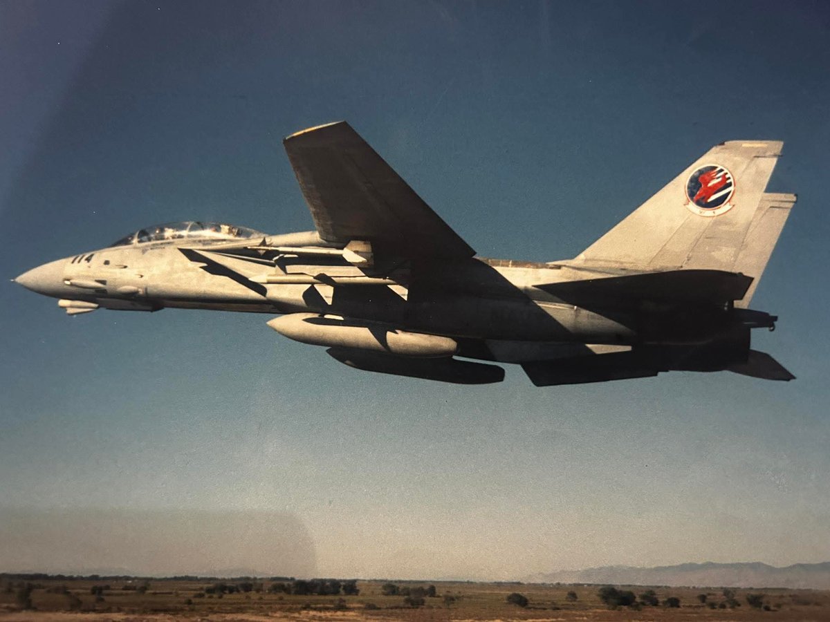 TexSandlin's tweet photo. Happy #TomcatTuesday! A little "Movie Magic" today...this is one of the Top Gun movie birds, still painted up as Maverick and Goose's 114. We were flying home from NAS Fallon to Miramar after finishing the film detachment and I took this pic. 😎 https://t.co/Nt8dg0xDNm