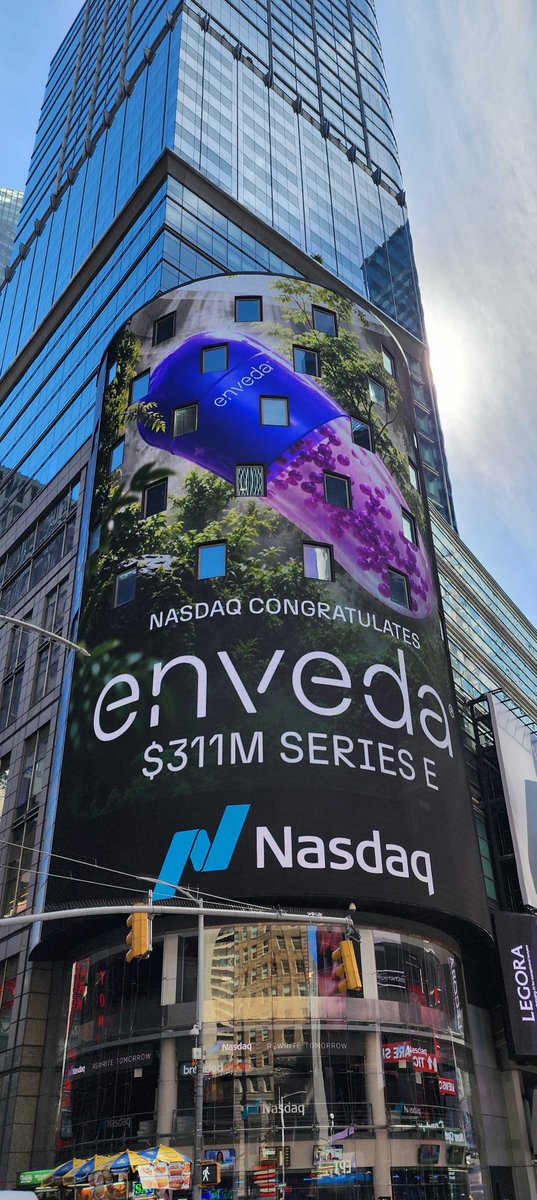 enveda's tweet photo. Enveda on the @Nasdaq Tower in @TimesSquareNYC.  This special moment was made even better by having our Founder and CEO, @viswacolluru there in person to take it in.  

The display marked our $311 million Series E and the years of work behind it: every experiment, every molecule, every late night, every setback that taught us something, and every hard problem solved by our team. 

The financing reflects the confidence an exceptional group of investors has placed in Enveda’s platform, pipeline, and long-term ambition. That confidence also carries a responsibility to put the capital to work with discipline and urgency, moving our medicines forward and continuing to turn life’s chemistry into better options for patients.  

Thank you to our friends at Nasdaq for marking the moment so beautifull
y.  
#Enveda #LearningfromLife #AI #Biotech