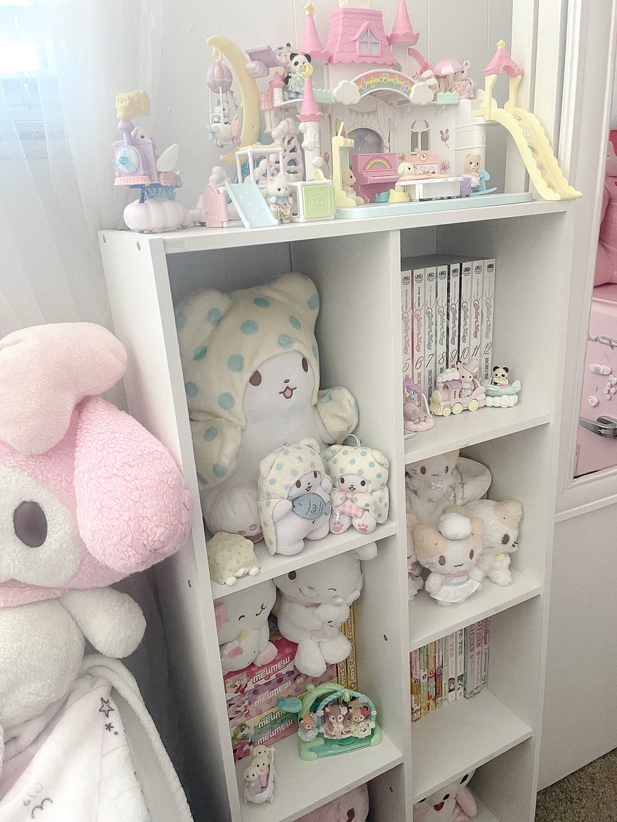 tomie's tweet photo. do u guys like my pastel shelf https://t.co/ePKSxjOILJ