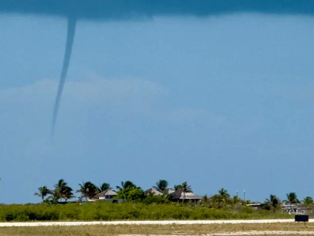 ICWR's tweet photo. ICWR observer pilot David Benna spotted this waterspout today (October 6) off of Big Ambergris Cay, Turks and Caicos. Send us your reports! https://t.co/D5mEYAdYed https://t.co/wfGs4z7kKY