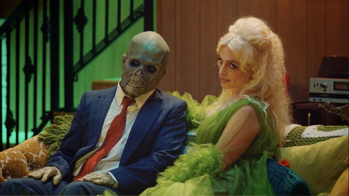 HalloweenDaily's tweet photo. The Widow and Charlie are here! BETTER LUCK THAN CHUCK creators Tony Wash and Meredith Tummillo, and actors Alexis Allotta and Adam Michaels, who play hosts, talk their horror trivia game show, and Halloween in our NEW INTERVIEW. Watch:  https://t.co/CN1FF0jfN0   🎃 https://t.co/Q2OzV295eB