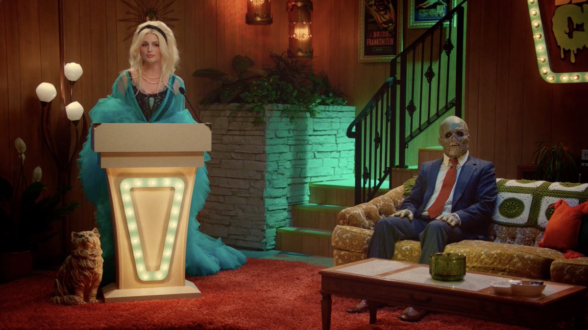 HalloweenDaily's tweet photo. The Widow and Charlie are here! BETTER LUCK THAN CHUCK creators Tony Wash and Meredith Tummillo, and actors Alexis Allotta and Adam Michaels, who play hosts, talk their horror trivia game show, and Halloween in our NEW INTERVIEW. Watch:  https://t.co/CN1FF0jfN0   🎃 https://t.co/Q2OzV295eB