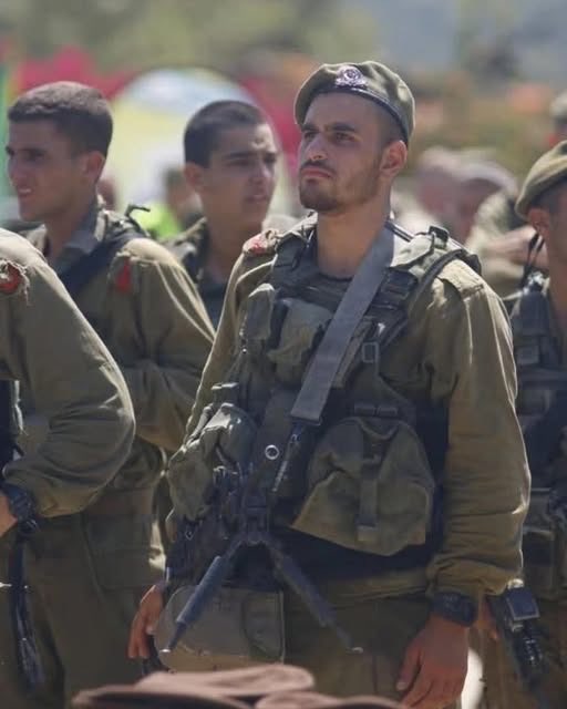EliAfriatISR's tweet photo. This is the story of Tomer Nagar.

On October 7th at 6 am, Tomer went on guard duty at the Kissufim base.

Tomer, a young soldier who had been serving for about 10 months, was on guard duty alone with his weapon – a Negev machine gun – and a full ammunition load – 675 rounds.

A little over half an hour passed peacefully, until at 6:37 the Hamas terrorists began their invasion right before his eyes.

First on motorcycles, later on foot.

The observers at the post saw the vast array of forces of the invading force and realized that Tomer's chances of surviving alone against them were zero.

Therefore, he was ordered from the base's operations room to run inside immediately.

Tomer had other plans.

He saw many soldiers trapped in the bunker and realized that the only way to save them was to cover their retreat back to the base with fire.

He also realized that the isolated forward position he held was delaying the enemy's advance and giving the soldiers at the post precious minutes to dress and arm themselves, take up defensive positions, and prepare for combat.

Tomer Nagar decided, without why or how to ignore the repeated calls on the radio calling him to return to the post and save himself, and instead to fight alone. 

With coolness, courage, combat professionalism, bravery, and unparalleled sacrifice, he remained in the bunker, and for forty full minutes he waged a calculated, single-handed battle that achieved both of his goals: The rescue of the soldiers from the shelter and the purchase of the precious time needed for the Kissufim outpost to organize and prepare for combat.

Tomer Nagar fired all the ammunition he had, down to the last bullet, and hit dozens of terrorists.

His body was found in his position in the bunker, surrounded by 675 empty Negev machine gun cartridges.

What is heroism? This is heroism.

May his memory be blessed.