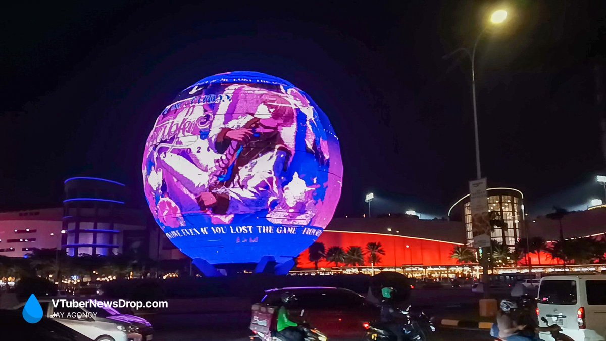 VTuberNewsDrop's tweet photo. SNAPSHOTS: NewsDrop was at Cosplay Mania 2026 and other activities around SMX Manila last weekend
· HOLOSTARS fans in classroom mode
· Nenechi’s flower stand (PH debut)
· NIJISANJI pape at the cafe
· Seible on the Mall of Asia Globe

Stay tuned for our event report! https://t.co/7G7bkxr5RU