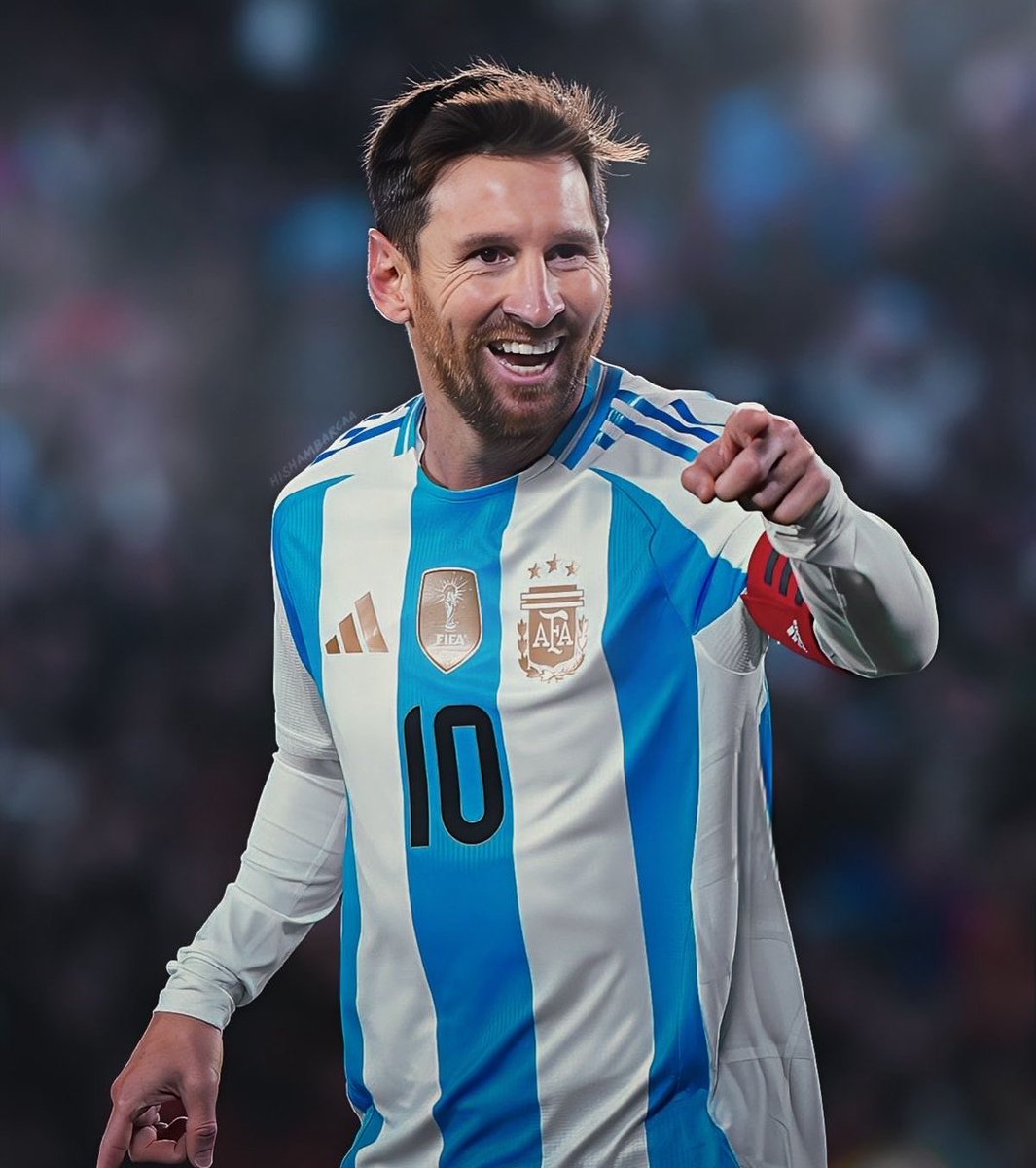 ChinoUTD's tweet photo. 🚨 Lionel Scaloni on Lionel Messi’s farewell performance:

“I have a theory about passes from Leo.

They are not normal passes.

A normal pass gives you the ball.

Leo gives you the ball and somehow also gives you an idea.

I noticed this years ago in training.

A player would receive the ball from someone else, control it, look around and decide what to do.

Then Leo would pass to the same player and suddenly he was playing one-touch football.

I once stopped training.

‘Why did you do that?’

The player looked confused.

‘Do what?’

‘Leo passed to you and suddenly you became a better footballer.’

Everyone laughed.

Leo said, ‘Maybe my pass was better.’

I looked at him.

‘This is exactly the arrogance I’m investigating.’

He smiled.

But there is something strange about it.

Leo gives you a pass and you feel obligated to complete the move properly.

You think, ‘Lionel Messi has just found me. I cannot embarrass this pass.’

Today was supposed to be his farewell.

Emotional day. Tributes. The stadium stopping in the tenth minute.

And Leo apparently decided his final responsibility was improving everybody around him one last time.

We get a corner.

Leo takes it.

Otamendi scores.

I just looked towards the bench.

Of course.

Even his corners have this annoying habit of becoming somebody else’s goal.

Then Nico Paz comes on.

Before he went on, I told him, ‘Enjoy this. You may never play another Argentina match with Leo, so remember everything.’

Nico nodded.

A few minutes later Leo gives him the ball outside the area.

Nico could recycle possession.

Apparently receiving the ball from Messi makes young players forget sensible options exist.

He shoots.

Beautiful goal.

I turned to my staff.

‘You see?’

‘See what?’

‘The disease.’

‘What disease?’

‘Messi passed to him and now Nico thinks he can score from anywhere.’

Then I saw Nico celebrating and Leo pointing and walking towards him smiling.

I thought, ‘This poor boy is finished.’

Because now every time Nico receives the ball there, he’ll remember that one time Messi gave it to him and everything worked.

That is the problem with Leo.

He doesn’t only make difficult things look easy himself.

He convinces the player beside him that difficult things are easy too.

You can spend all week coaching movements.

Then Leo gets the ball and the tactical instruction becomes very simple.

‘Everybody be ready.’

Because something is probably about to happen.

I remember once telling him, ‘Do you realise how many assists you get because somebody produces an incredible finish?’

He said, ‘Then maybe I choose good people to pass to.’

‘No. I think you hypnotise them.’

He laughed.

Today didn’t help his defence.

Otamendi scores from his delivery.

Nico receives his pass and hits one from outside the box.

Then Leo decides assisting everybody else is becoming repetitive, so he scores himself.

Two assists and a goal in his farewell.

That is such a Messi way to leave.

Even on the day football is supposed to celebrate him, he spends half the match making everybody around him look good.

Maybe that is the part Argentina will miss that statistics cannot explain.

We can find goals.

We can find assists.

But I don’t know where you find another player who gives a teammate the ball and somehow makes him feel ten times better for the next five seconds.

After Nico scored, I told one of my assistants, ‘We have a serious problem.’

‘What?’

I pointed at Leo.

‘Soon these boys are going to have to do all this without him.’

He laughed.

I didn’t.

Because that might be the hardest part of replacing Lionel Messi.

It isn’t finding somebody who knows what to do when he gets the ball.

It’s finding somebody who makes everyone else know what to do when they get it.”