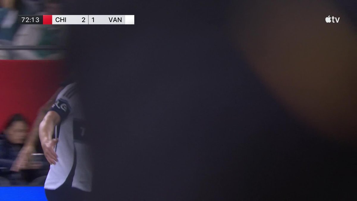 A blurry screenshot of an Apple TV broadcast showing a soccer match scoreboard with CHI 2, 1 VAN at the 72:13 minute mark.