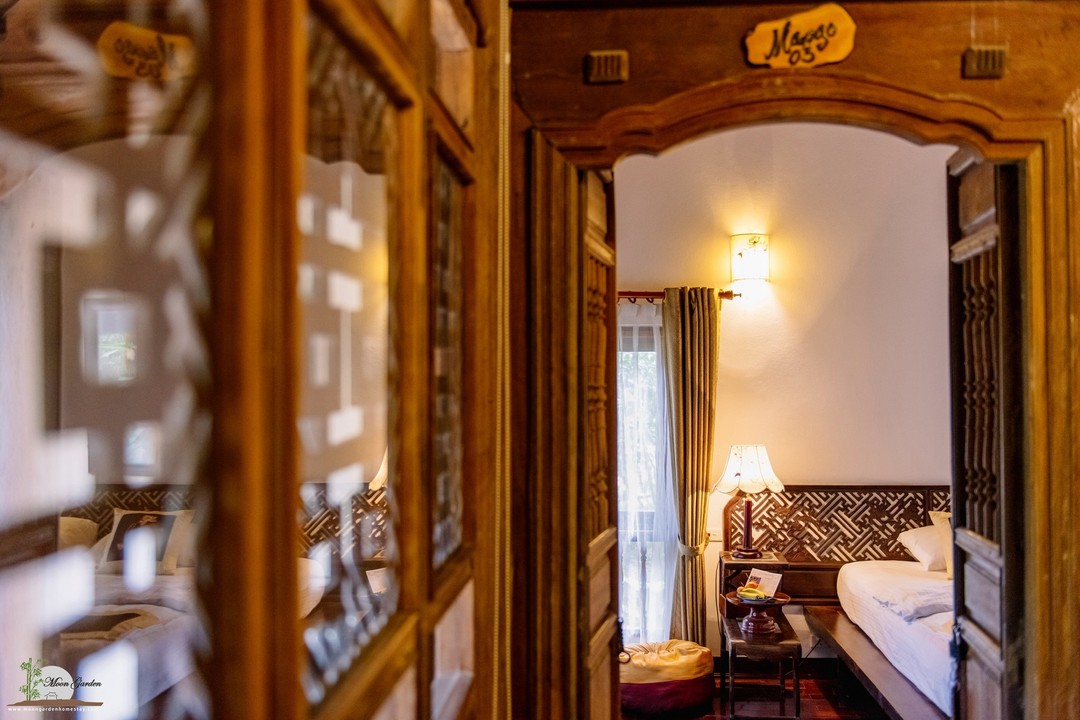twiteoman's tweet photo. A peaceful glimpse of village life, where Moon Garden’s ancient homes preserve timeless stories in every tile and object. Traditional three- and five-room houses blend rustic heritage with modern comfort for a memorable stay. https://t.co/f8ehJ0I5wM