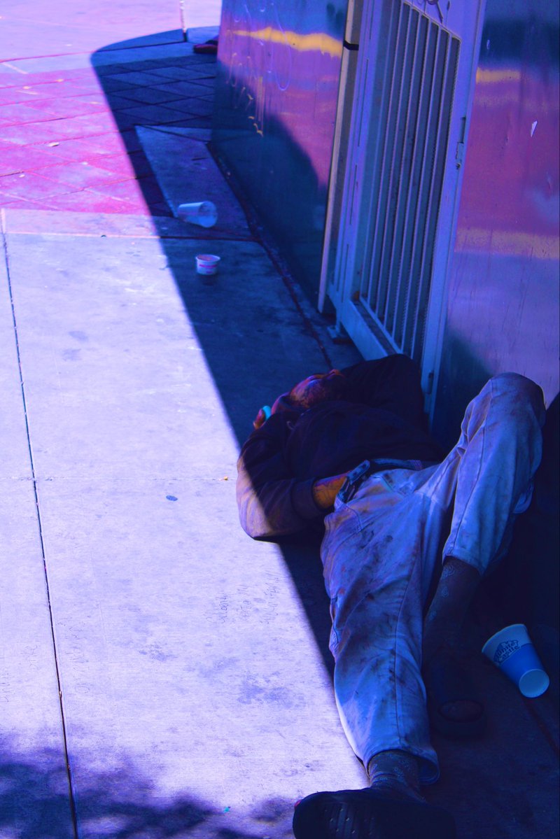 Owlqsk's tweet photo. A current state of affairs. No I didn’t record myself giving the homeless guy a dollar, but I did leave a Natural Light next to him for his contribution. #phototime https://t.co/CX4egiiykY