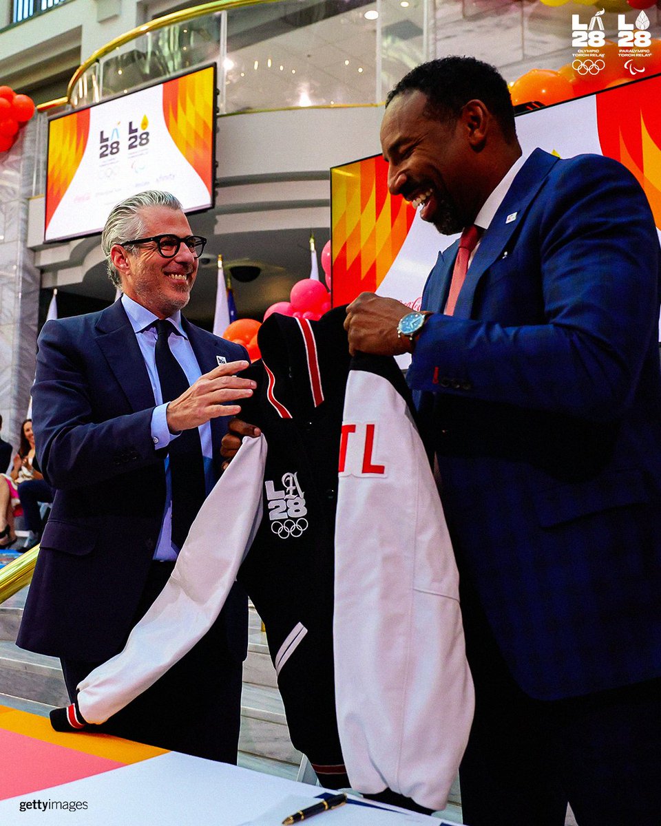 LA28's tweet photo. A warm welcome in Atlanta! 🔥 In 2028, the Olympic &amp; Paralympic Torch Relays are coming back to the U.S. and it all starts in Atlanta. This morning we celebrated the announcement live from ATL with our four Presenting Partners, members of LA28 and the athlete community. https://t.co/l2WuvN6APt