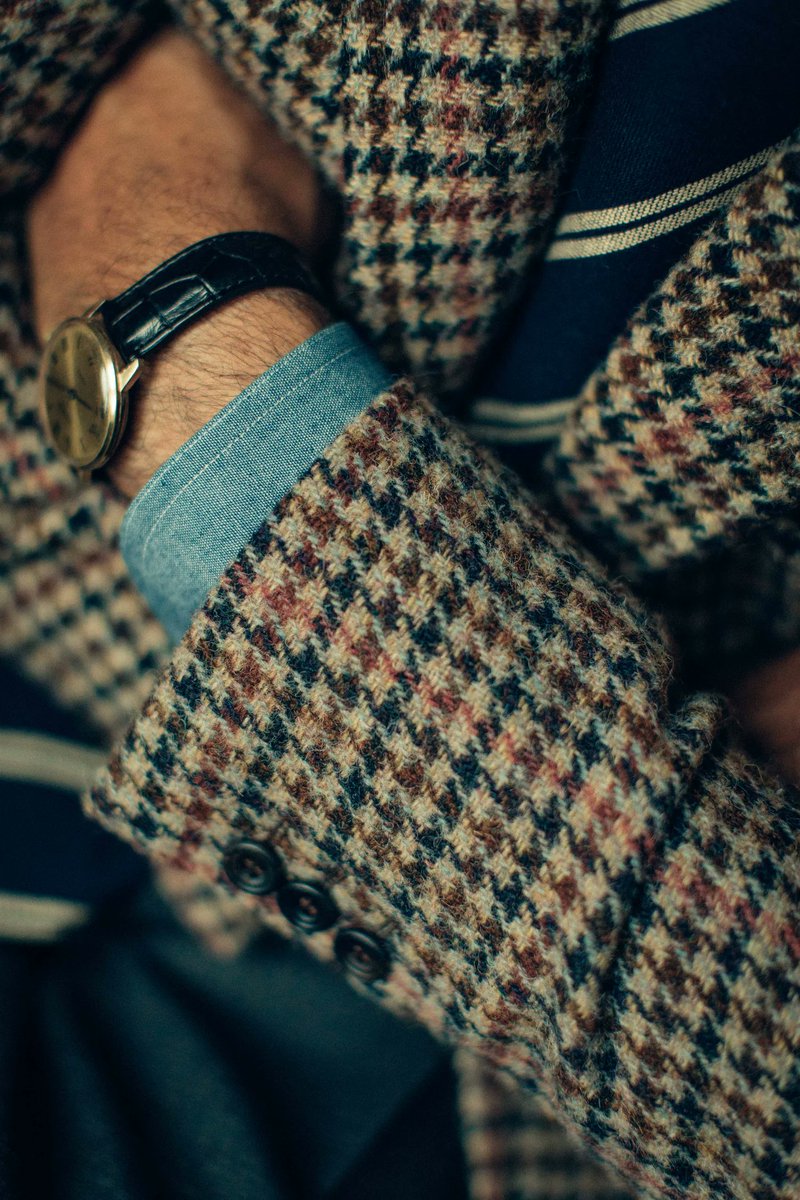 dieworkwear's tweet photo. Yes.

If you like the look of tweed but live in a warmer climate or don't want to look too rustic, here is what you should know when shopping.

Let's start with the basics. In men's tailoring, fabric comes in different weights, from 3oz per square meter (used for summer shirts) to 32 oz per square meter (used for heavy overcoats).

Most men's suits and sport coats are made from fabrics ranging from 8oz to 16 oz, with the 12oz to 14oz range considered mid-weight by most tailors.

If you run warm or live in a warmer climate, you can go for lighterweight fabrics (although, as a general rule, you should always wear the heaviest fabric you can bear, as this material hangs better and is more forgiving in terms of tailoring).

But there's another important dimension buried deep in the yarn. Broadly speaking, there are two types of yarn: worsted and woolen. Perhaps these terms should be renamed combed and uncombed, because the combing process mostly distinguishes them.

Before fibers are spun into yarn, they can be combed, which aligns the hairs and removes the shorter fibers. Once spun, this creates a stronger, smoother yarn known as worsted. Conversely, the shorter fibers can be left in, producing what's known as woolen yarn.

Worsted is what you see hanging on the rack when you shop for wedding suits (e.g., smooth navy and gray suits you associate with formal occasions or business meetings). Woolen is what you will think of when you imagine tweed.

I've attached four photos below. In the first two photos, we see Harris Tweed, which is purely made from woolen yarns. Notice how the fabric is very spongy, thick, and hairy. This is the effect of short and long fibers being mixed together and pointing in every direction. This is a 15/16oz fabric.

In the last two photos, we see a sport coat made from Harrison's Glorious Twelfth fabric, which is made with worsted yarns (it may be a blended woolen/ worsted, but there's definitely a strong presence of worsted). Notice how the fabric is smoother, which results from removing the shorter fibers. Because the resulting yarn is more resilient, the weaver can produce a lighter-weight cloth. This is a 10/11oz fabric.

Switching from woolen to worsted does three things. As mentioned, it allows you to produce lighter-weight materials. Second, it creates a smoother fabric, which traps less heat. Fuzzy materials create a ton of air pockets, which is what keeps you warm. Third, it makes the jacket look less rustic. Mark Dunsford, director of Harrison's of Edinburgh (my favorite fabric merchant), once described his Glorious Twelfth fabric to me as "city tweeds."

Unfortunately, most ready-to-wear clothiers will not give you this kind of granular information (a fault of both fashion media and retail, which still focus more on communicating trends than on clothing construction). So you will have to learn how to distinguish these things by feel. But with practice, you can find the right tweed by thinking about fabric weight and worsted/woolen yarns.