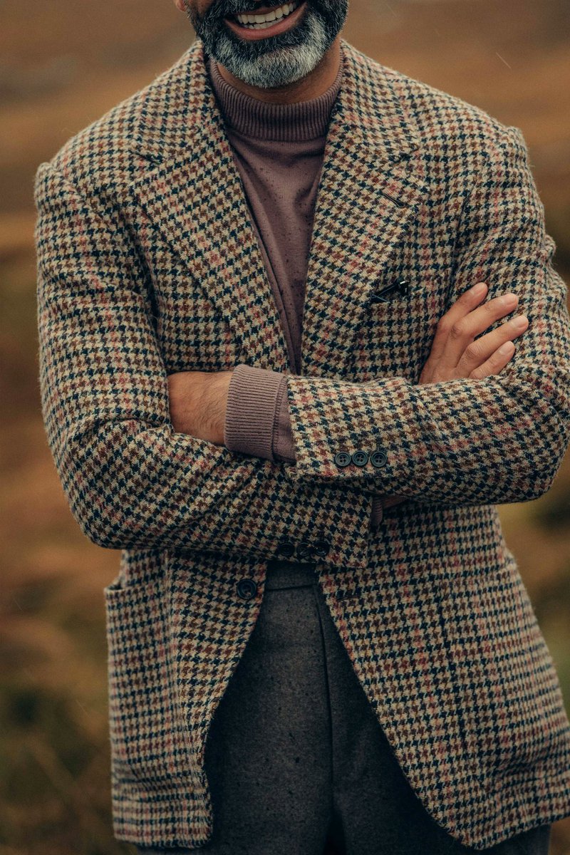 dieworkwear's tweet photo. Yes.

If you like the look of tweed but live in a warmer climate or don't want to look too rustic, here is what you should know when shopping.

Let's start with the basics. In men's tailoring, fabric comes in different weights, from 3oz per square meter (used for summer shirts) to 32 oz per square meter (used for heavy overcoats).

Most men's suits and sport coats are made from fabrics ranging from 8oz to 16 oz, with the 12oz to 14oz range considered mid-weight by most tailors.

If you run warm or live in a warmer climate, you can go for lighterweight fabrics (although, as a general rule, you should always wear the heaviest fabric you can bear, as this material hangs better and is more forgiving in terms of tailoring).

But there's another important dimension buried deep in the yarn. Broadly speaking, there are two types of yarn: worsted and woolen. Perhaps these terms should be renamed combed and uncombed, because the combing process mostly distinguishes them.

Before fibers are spun into yarn, they can be combed, which aligns the hairs and removes the shorter fibers. Once spun, this creates a stronger, smoother yarn known as worsted. Conversely, the shorter fibers can be left in, producing what's known as woolen yarn.

Worsted is what you see hanging on the rack when you shop for wedding suits (e.g., smooth navy and gray suits you associate with formal occasions or business meetings). Woolen is what you will think of when you imagine tweed.

I've attached four photos below. In the first two photos, we see Harris Tweed, which is purely made from woolen yarns. Notice how the fabric is very spongy, thick, and hairy. This is the effect of short and long fibers being mixed together and pointing in every direction. This is a 15/16oz fabric.

In the last two photos, we see a sport coat made from Harrison's Glorious Twelfth fabric, which is made with worsted yarns (it may be a blended woolen/ worsted, but there's definitely a strong presence of worsted). Notice how the fabric is smoother, which results from removing the shorter fibers. Because the resulting yarn is more resilient, the weaver can produce a lighter-weight cloth. This is a 10/11oz fabric.

Switching from woolen to worsted does three things. As mentioned, it allows you to produce lighter-weight materials. Second, it creates a smoother fabric, which traps less heat. Fuzzy materials create a ton of air pockets, which is what keeps you warm. Third, it makes the jacket look less rustic. Mark Dunsford, director of Harrison's of Edinburgh (my favorite fabric merchant), once described his Glorious Twelfth fabric to me as "city tweeds."

Unfortunately, most ready-to-wear clothiers will not give you this kind of granular information (a fault of both fashion media and retail, which still focus more on communicating trends than on clothing construction). So you will have to learn how to distinguish these things by feel. But with practice, you can find the right tweed by thinking about fabric weight and worsted/woolen yarns.