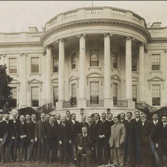 archeohistories's tweet photo. President Theodore Roosevelt officially named the Executive Mansion "The White House" in 1901 and carried out a major 1902 renovation that created the West Wing. He hired the prominent New York firm McKim, Mead & White to modernize the aging structure. They built a separate temporary executive office building—known today as the West Wing—to move presidential workspaces out of the main residential living quarters... 

The White House, during the administration of Theodore Roosevelt, was a little different—to say the least. Roosevelt, who believed in the "strenuous life" with a fervor bordering on zealotry, brought not just his irrepressible energy but also an army of children and a veritable zoo with him to 1600 Pennsylvania Avenue. The corridors echoed with the clatter of young feet—Roosevelt's six rambunctious children, including Kermit and Quentin, were known to unleash a pack of ponies through the East Room or stage impromptu boxing matches. Meanwhile, the family’s pets, which included a badger named Josiah, a macaw, a garter snake, and a barn owl, freely roamed the White House grounds, much to the chagrin of more staid visitors. “The president was in constant motion,” one bemused congressman recalled, “and so was everything around him.” 

But nothing embodied Roosevelt’s unorthodox leadership more than his infamous "walk-and-talk" sessions, during which any poor soul who sought his ear would be whisked away on what could only be described as an endurance test masquerading as conversation. Senators, used to the plush leather chairs of committee rooms, found themselves breathless as Roosevelt marched them up hills, through thick brush, and over rocky streams in Rock Creek Park. "I can talk politics just as well outdoors as I can in the office," Roosevelt would bellow with a grin, while his guests gasped for air. Those who couldn't keep up were simply left behind. And though many a congressman would have preferred discussing tariffs seated by a fire, none dared suggest it. As one exhausted senator was heard to mutter after a grueling hike, "Theodore Roosevelt believes in democracy—just not on flat ground."

#archaeohistories